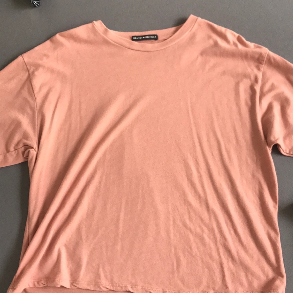 BRANDY MELVILLE peach colored t-shirt